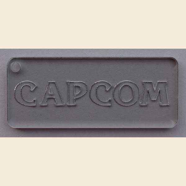 Schlüsselanhänger 'Capcom' rechteckig - klar